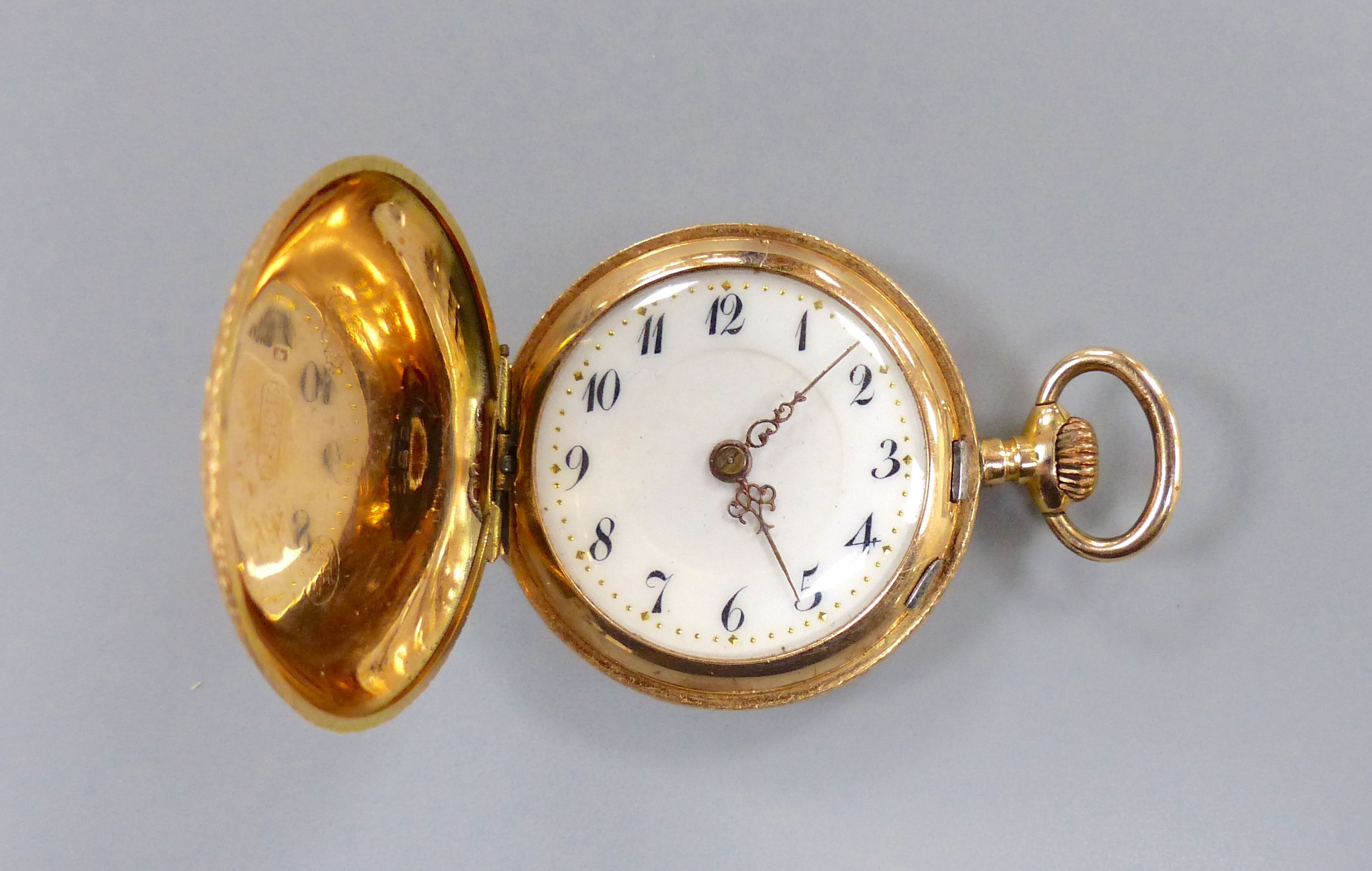 An early 20th century continental 585 yellow metal and enamelled fob watch, case diameter 30mm, gross 19.5 grams (a.f.).